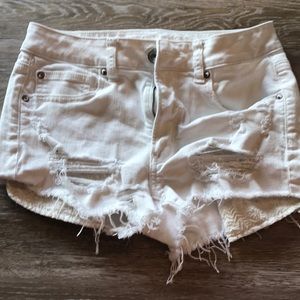 American Eagle distressed white shorts
